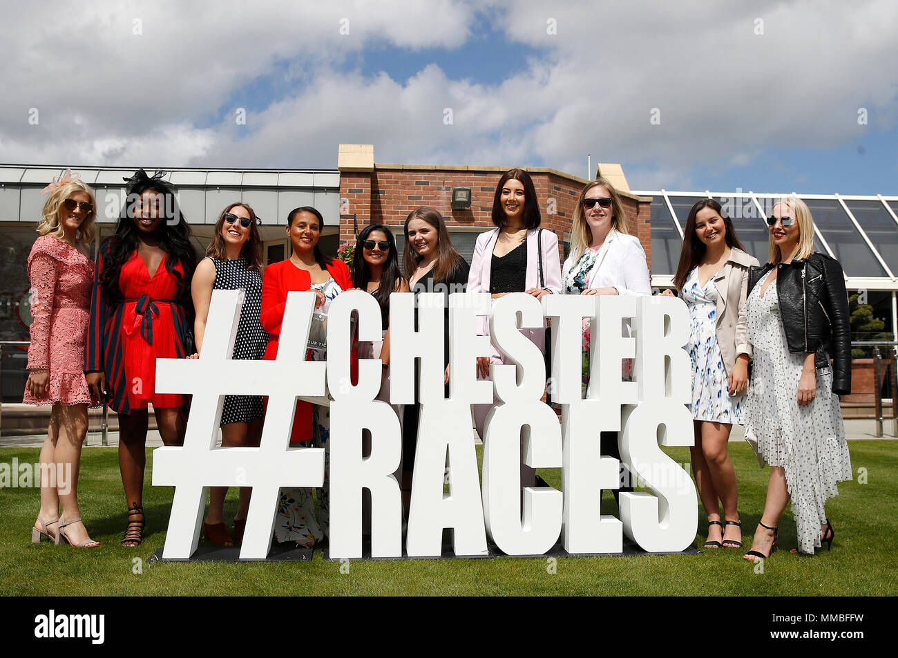 Racegoers arrive during Ladies Day of the 2018 Boodles May Festival at Chester Racecourse. Stock Photo