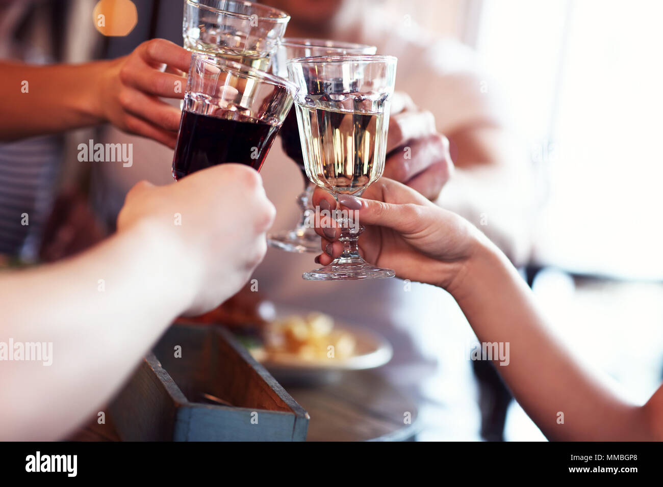 Group Of Friends Enjoying Meal In Restaurant Stock Photo - Alamy