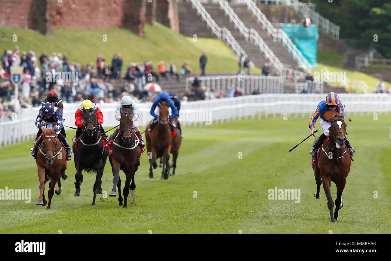 Rostropovich (right) ridden by Ryan Moore wins The HomeServe Dee Stakes, during Ladies Day of the 2018 Boodles May Festival at Chester Racecourse. Stock Photo