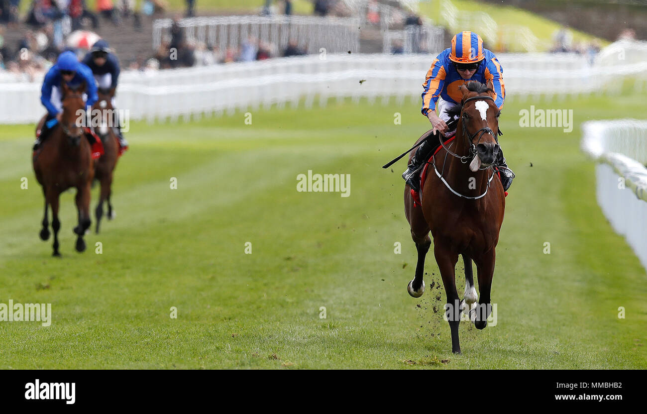 Rostropovich (right) ridden by Ryan Moore wins The HomeServe Dee Stakes, during Ladies Day of the 2018 Boodles May Festival at Chester Racecourse. Stock Photo