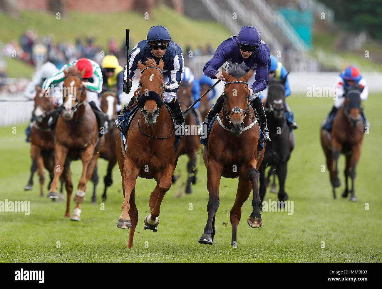 Another Batt (centre left) ridden by Silvestre De Sousa wins The Abbey Logistics Handicap Stakes from Dragons Tail (centre right) during Ladies Day of the 2018 Boodles May Festival at Chester Racecourse. Stock Photo