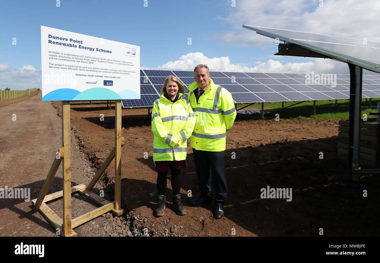 Leo Martin (right), MD of Civil Engineering at Graham Construction, with Sara Venning, CEO of NI (Northern Ireland) Water, at the opening of the new &pound;7 million solar farm at Dunore, which will supply electricity to NI Water&Otilde;s Dunore Water Treatment works in South Antrim. Stock Photo