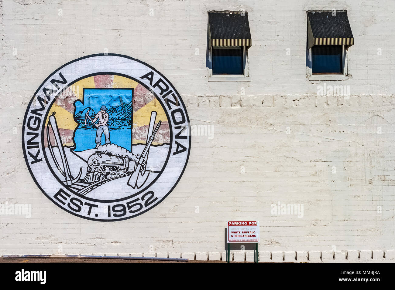 Mural designed logo of the city of Kingman, Arizona, painted on a brick wall of the Gruninger building. Stock Photo