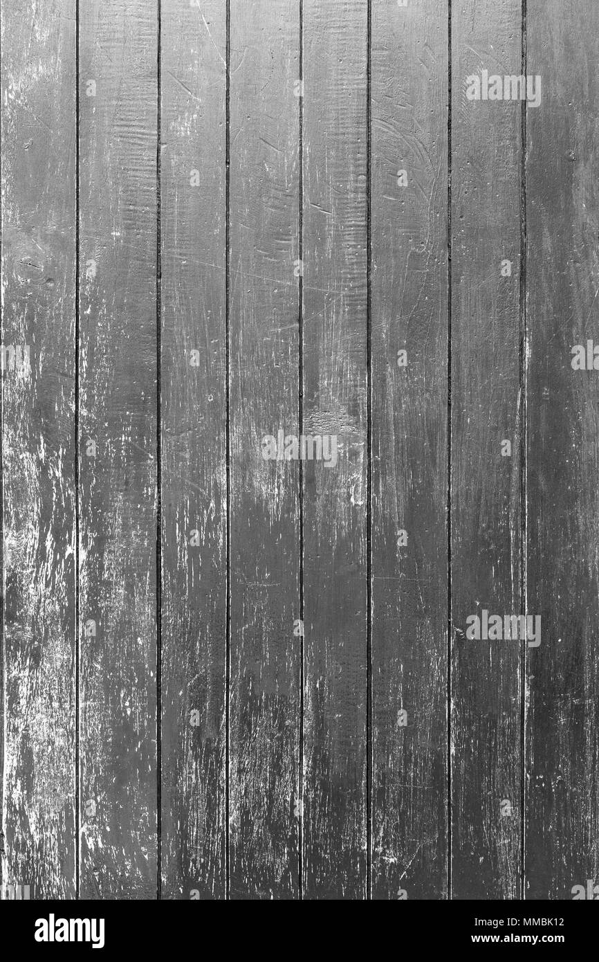 Full frame background of an old and faded wood board wall in black and white Stock Photo