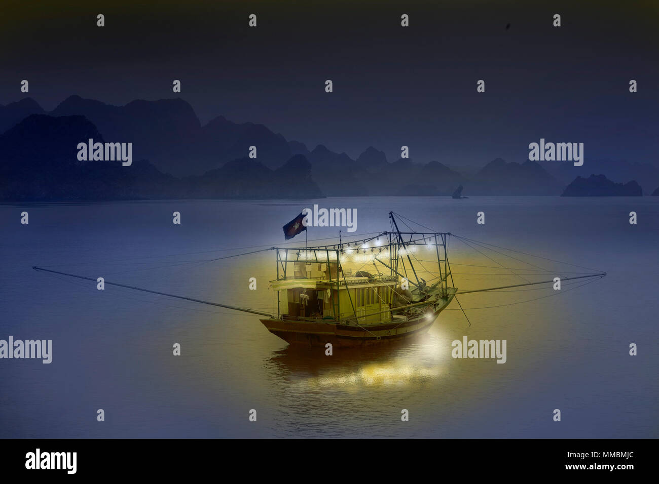 https://c8.alamy.com/comp/MMBMJC/vietnamese-squid-fishing-boat-late-evening-lights-are-used-to-attract-the-squid-to-the-surface-halong-bay-vietnam-MMBMJC.jpg