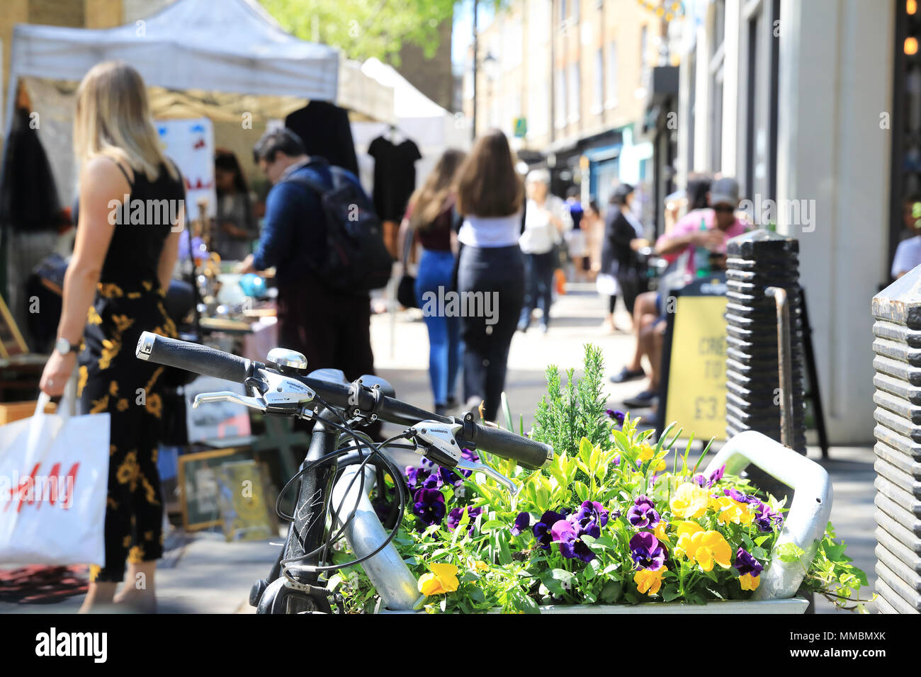 The cafes and shops on trendy Camden Passage off Upper Street in Islington, north London, UK Stock Photo