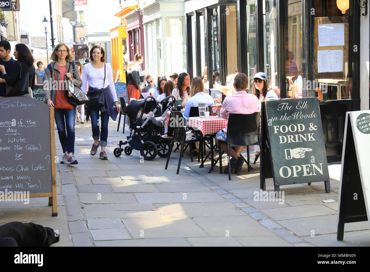 The cafes and shops on trendy Camden Passage off Upper Street in Islington, north London, UK