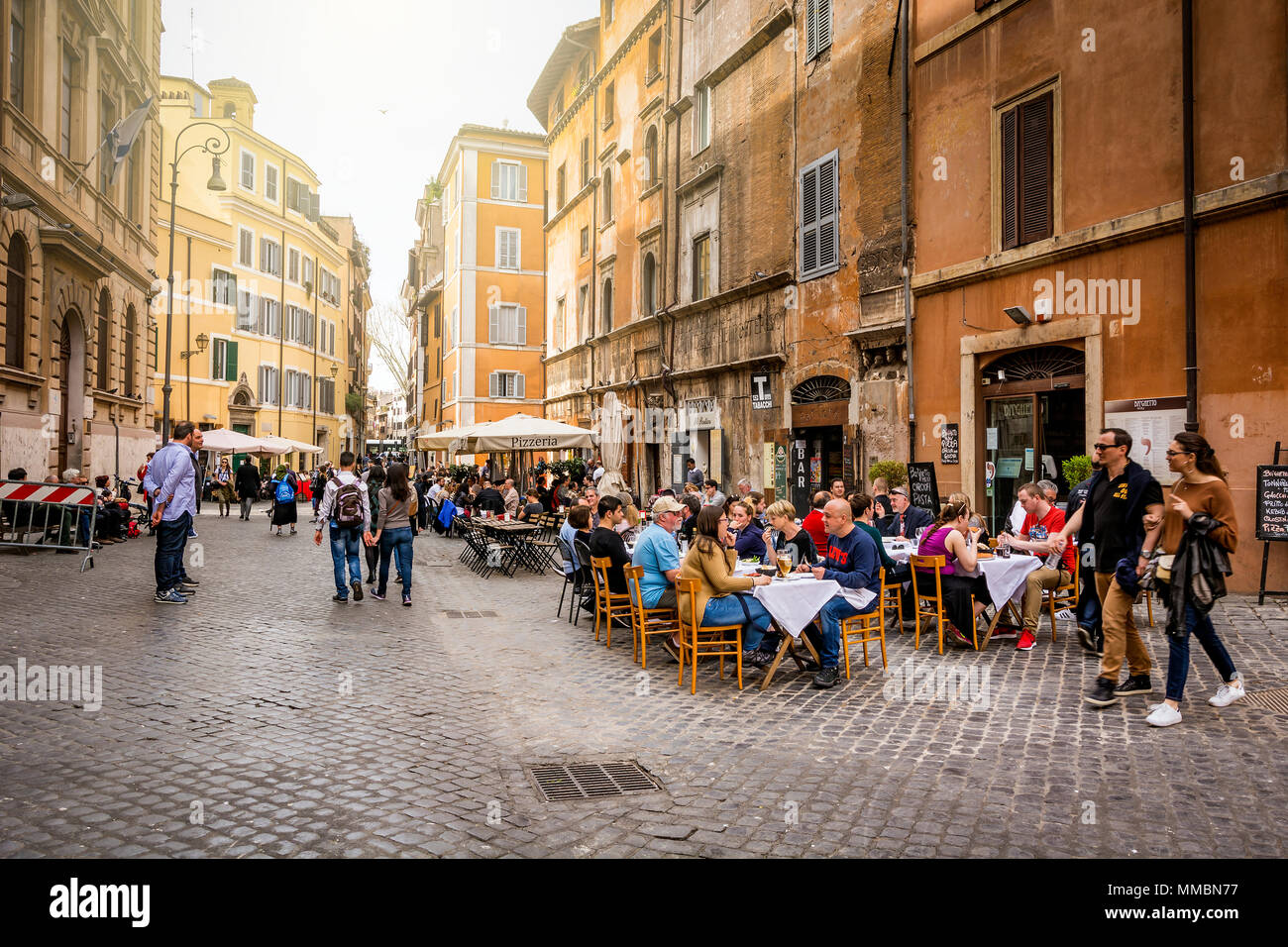 Rome, Italy, march 2017: unrecognizable people sitting in the kosher restaurant tables in the historic Jewish quarter of Rome Stock Photo