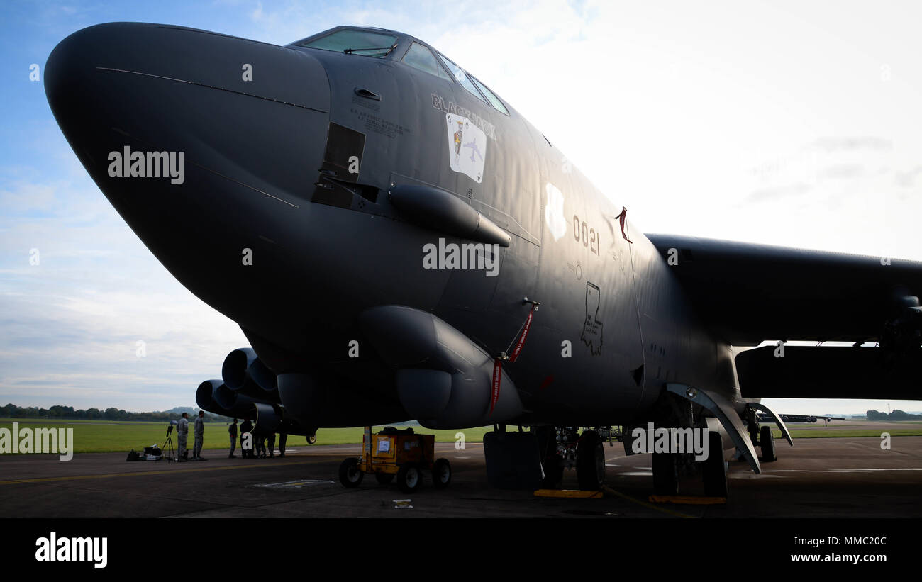 Airmen from the 96th Aircraft Maintenance Unit prepare to change a drive generator on a B-52 Stratofortress at Faiford Royal Air Force Base, U.K., Sept. 20, 2017. Drive generators must be changed if they overheat during a flight. The change takes around six hours to complete and will ensure continued power for B-52 electrical systems. (U.S. Air Force photo/Staff Sgt. Benjamin Raughton) Stock Photo