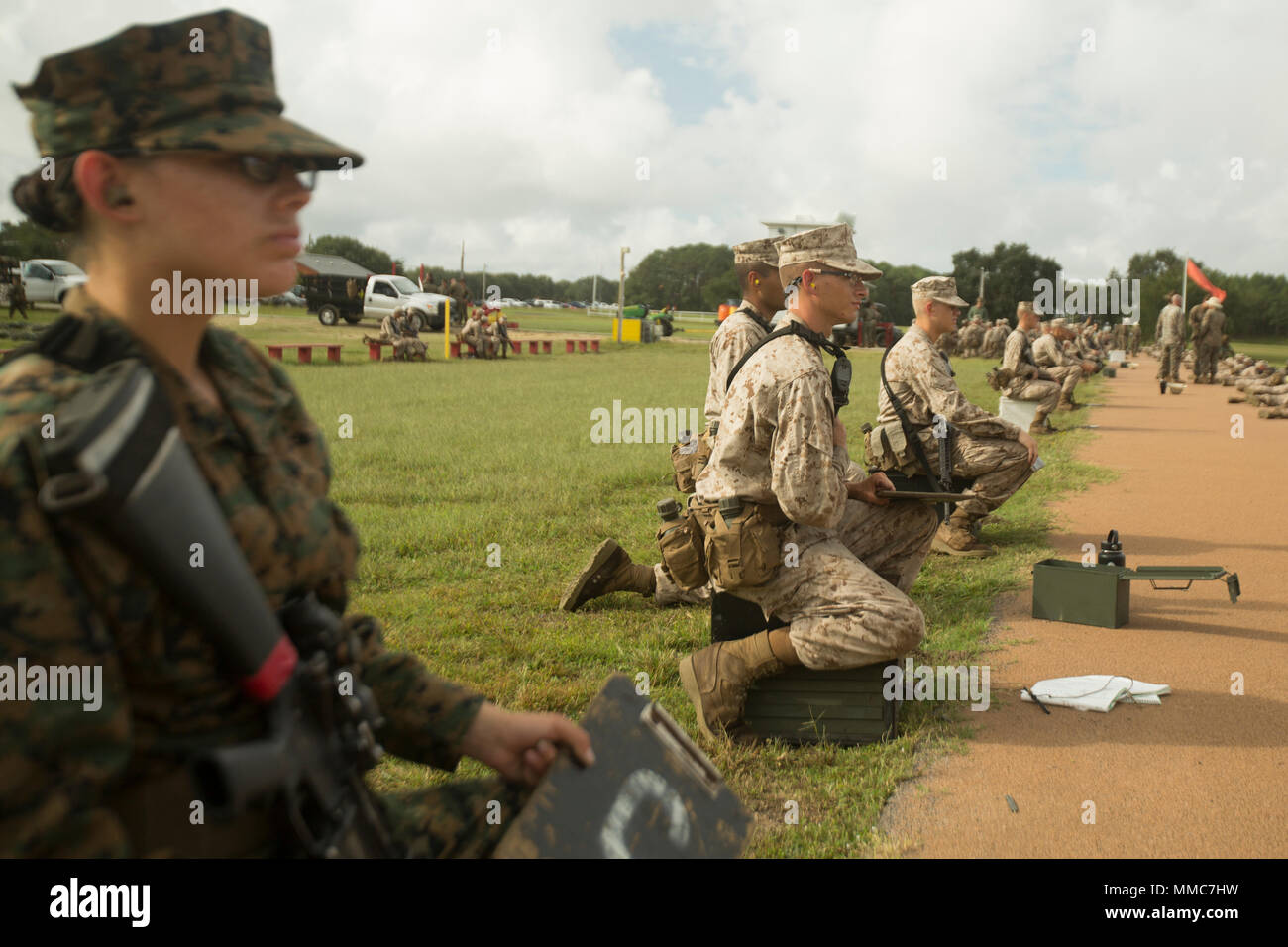 U.S. Marine Corps Recruits with Alpha Company, 1st Battalion, Recruit Training Regiment, and Papa Company, 4th Battalion, Recruit Training Regiment, wait to qualify with their rifles at Starlight Range on Marine Corps Recruit Depot, Parris Island, S.C., Oct. 10, 2017.  All recruits must participate in the rifle qualification course during the 2nd phase of recruit training. (U.S. Marine Corps photo by Lance Cpl. Yamil Casarreal/Released) Stock Photo