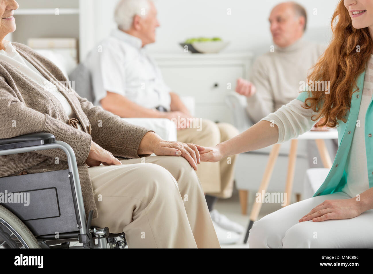 Nurse supporting the charge at nursing home Stock Photo Alamy