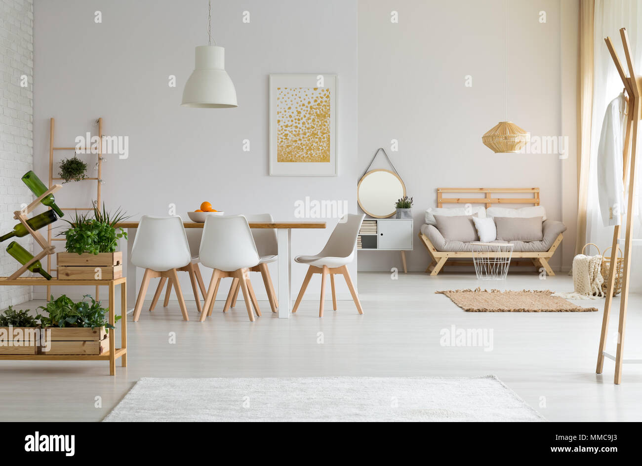 White and modern dining room with wooden furniture Stock Photo Alamy