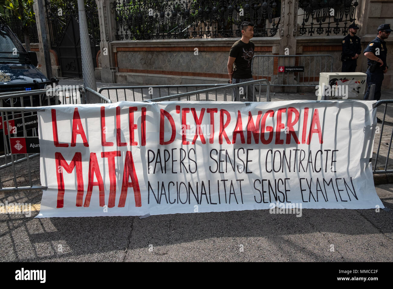 The Banner With The Demands Of The Immigrants The Law Of