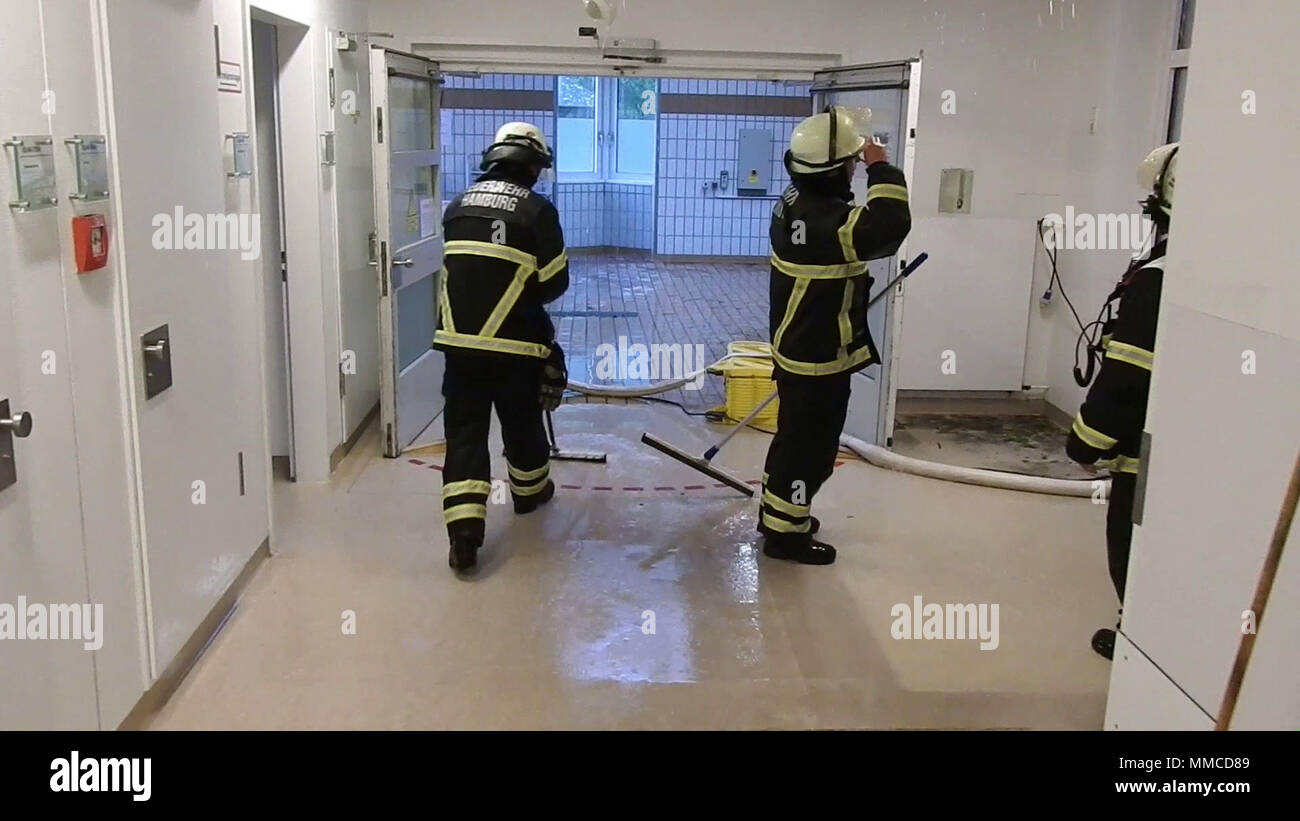 10 May 2018, Germany, Hamburg Firemen stand in the emergency room of