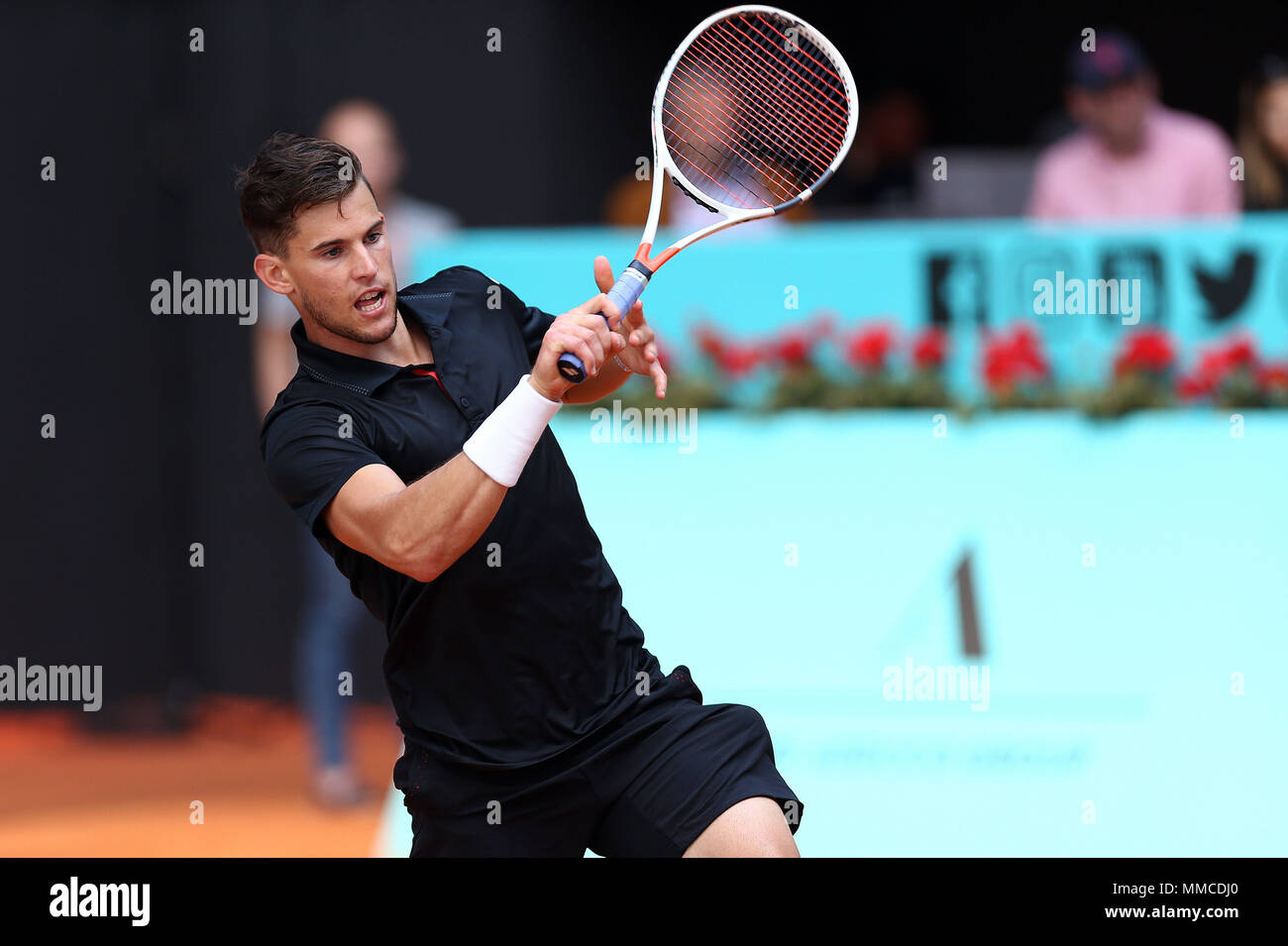 Madrid, Spain. 10th May, 2018. Dominic Thiem of Austria plays forehand against Borna Coric of Croatia in their third round match during day six of the Mutua Madrid Open tennis tournament at the Caja Magica. Credit: Manu Reino/SOPA Images/ZUMA Wire/Alamy Live News Stock Photo