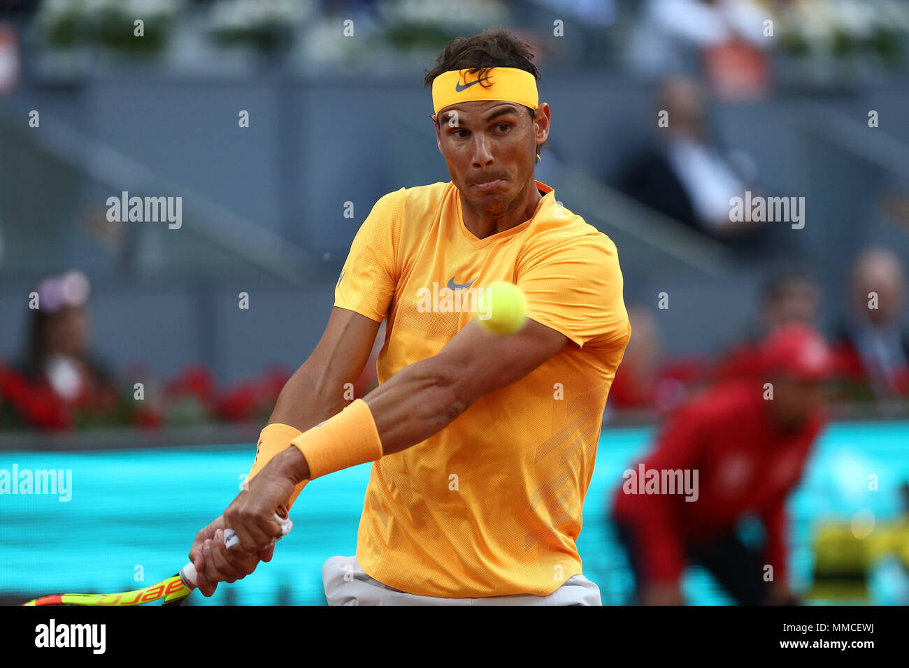 Madrid, Spain. 10th May, 2018. Rafael Nadal of Spain plays a backhand  against Diego Schwartzman of Argentina in their third round match during  day six of the Mutua Madrid Open tennis tournament