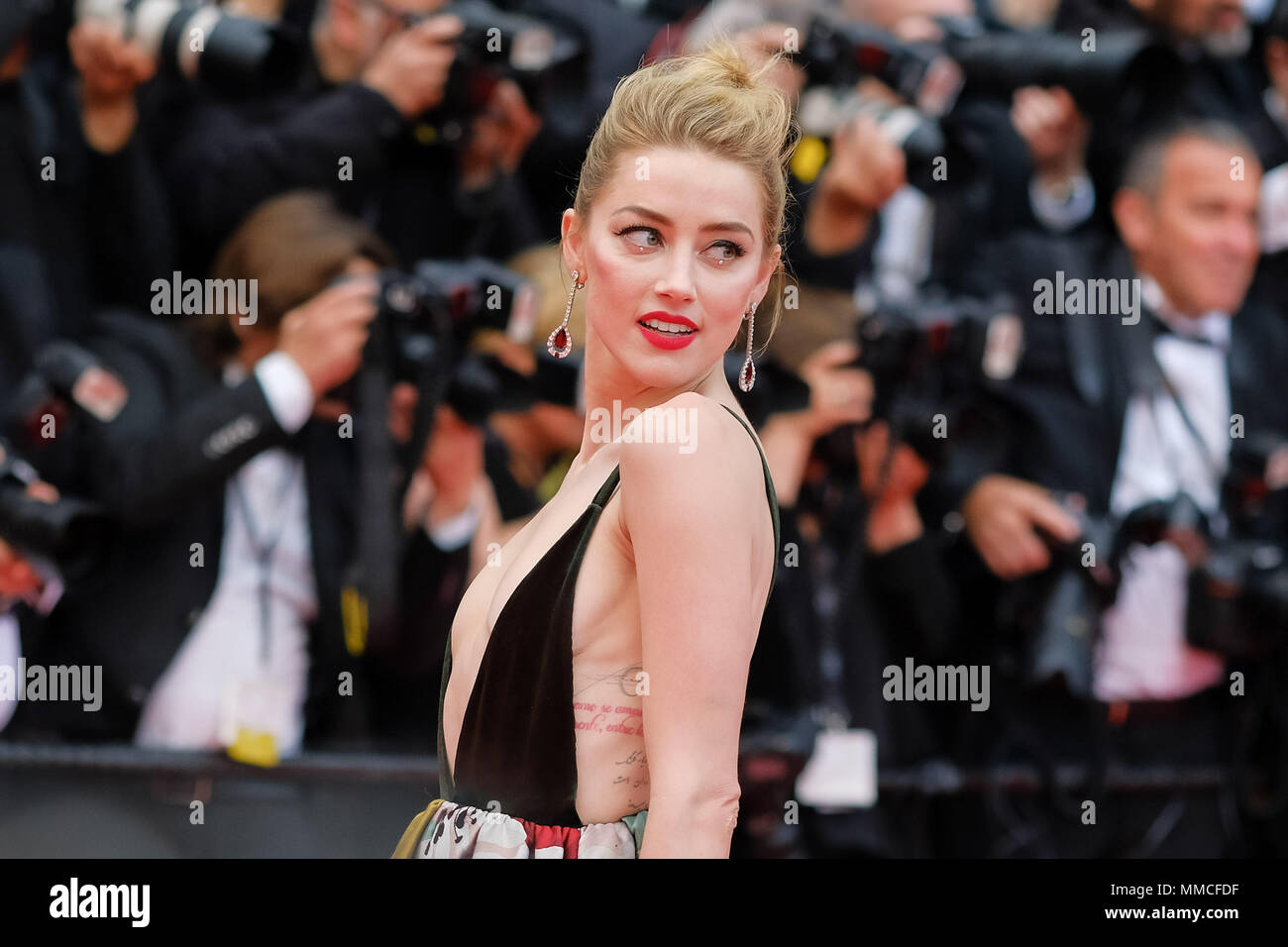 Cannes, France. 10th May, 2018. Amber Heard at the Sorry Angel Red Carpet Event on Thursday 10 May 2018 as part of the 71st International Cannes Film Festival held at Palais des Festivals, Cannes. The French title of the film is Plaire, aimer et courir vite . Pictured: Amber Heard. Picture by Credit: Julie Edwards/Alamy Live News Stock Photo