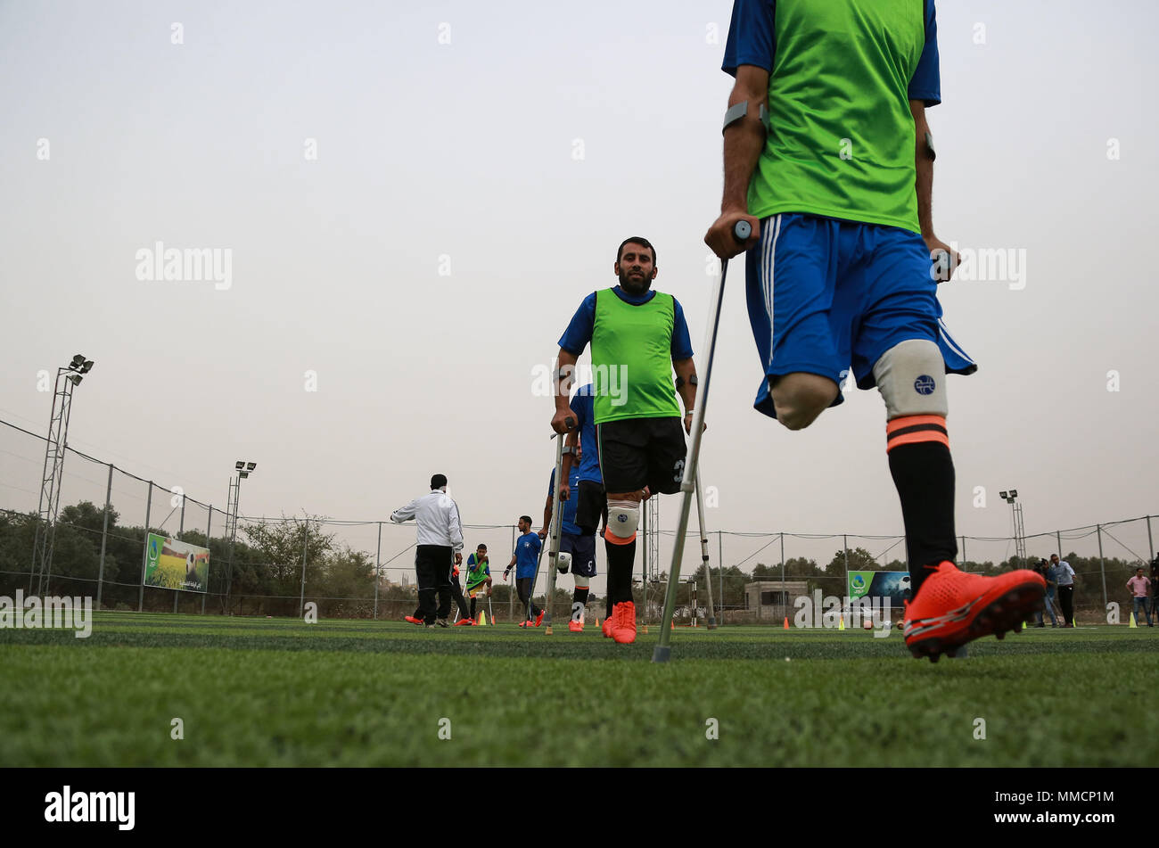 Gaza. 10th May, 2018. Palestinian amputee soccer players take part in a training session of their team at Municipality Stadium in Deir Al Balah, in the central Gaza Strip, on May 10, 2018. For the first time in the Palestinian Gaza Strip, a football team of male amputees was recently formed to lay the foundation for such a sport in the Israeli-blockaded territory. The 12-player team, named 'The Heroes', could be a glimmer of hope for many young people with amputations caused by frequent rounds of violence with Israel and other accidents. Credit: Stringer/Xinhua/Alamy Live News Stock Photo