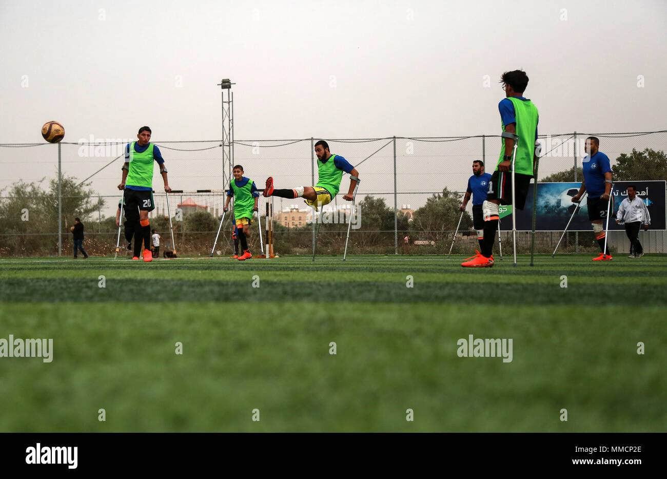 Gaza. 10th May, 2018. Palestinian amputee soccer players take part in a training session of their team at Municipality Stadium in Deir Al Balah, in the central Gaza Strip, on May 10, 2018. For the first time in the Palestinian Gaza Strip, a football team of male amputees was recently formed to lay the foundation for such a sport in the Israeli-blockaded territory. The 12-player team, named 'The Heroes', could be a glimmer of hope for many young people with amputations caused by frequent rounds of violence with Israel and other accidents. Credit: Stringer/Xinhua/Alamy Live News Stock Photo