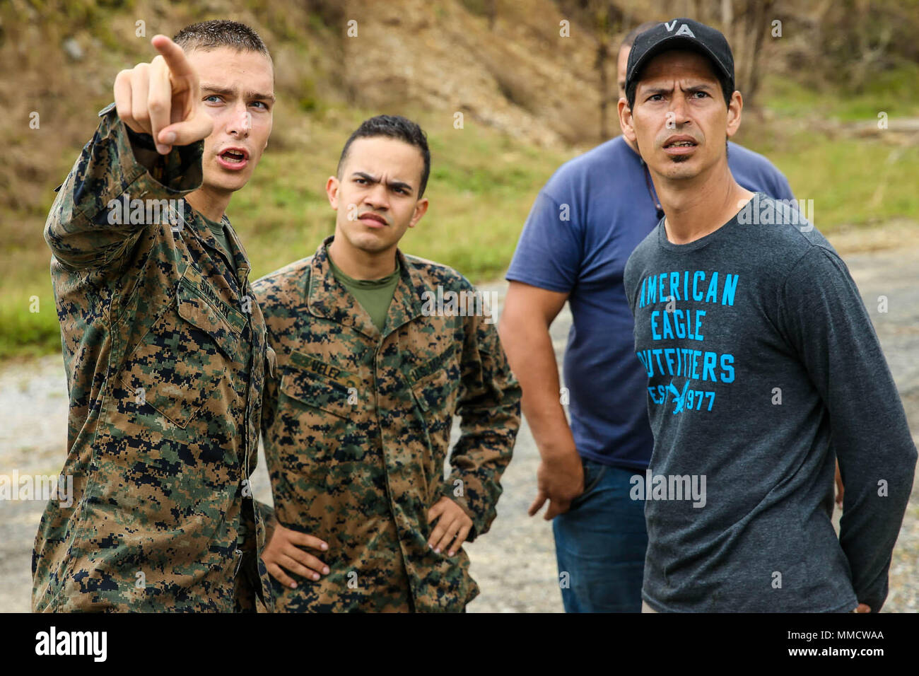 U.S. Marine Corps 1st Lt. Ian S. Simpson, left, a platoon commander for combat engineer platoon