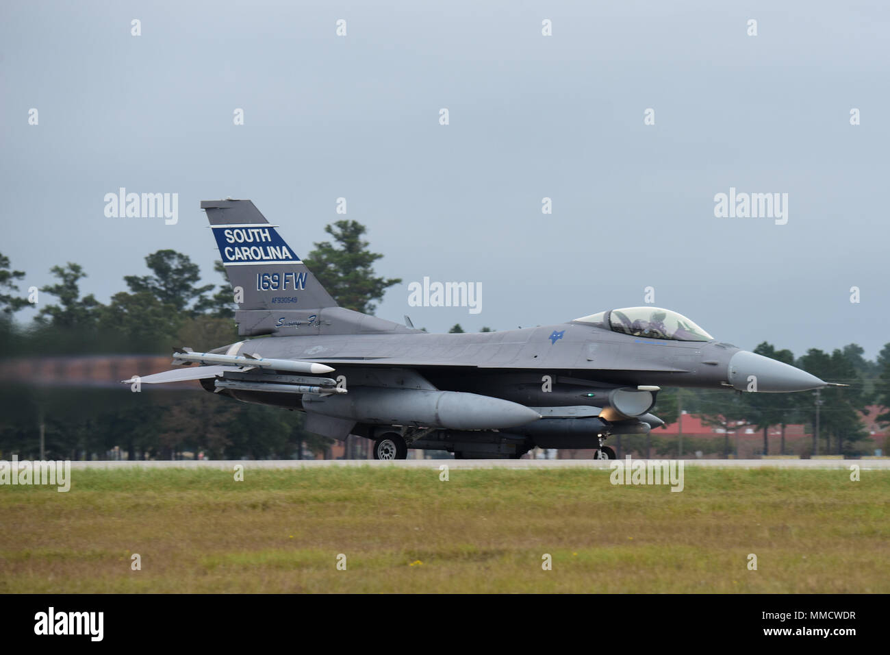 U.S. Air Force F-16 fighter jets from the South Carolina Air National Guard’s 169th Fighter Wing prepare for takeoff during end-of-runway operations at McEntire Joint National Guard Base, S.C., Oct. 14, 2017. This was part of routine training ensuring that the SCANG remains ready to accomplish the mission at a moment’s notice. (U.S. Air National Guard photo by Senior Airman Megan Floyd) Stock Photo