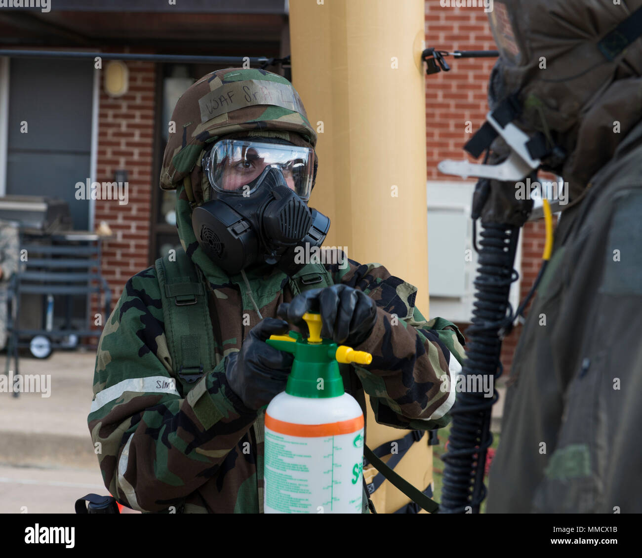 Senior Airman Kira Lang 138th Operations Group Aircrew Flight Equipment Specialist Works In A Decontamination Line During A Base Wide Exercise In Tulsa Okla October 14 2017 During The Decontamination Process Airmen