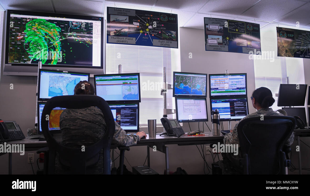 Two 26th Operations Weather Squadron forecasters keep track of the