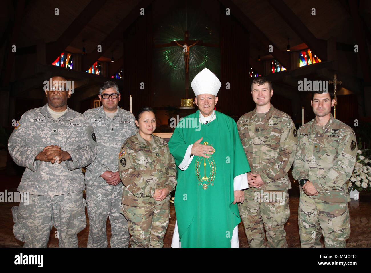 A special Catholic mass was held in honor of the California Army National Guard Oct. 15 at Saint John the Baptist Church in Napa, California, with Bishop Robert F. Vasa, Diocese of Santa Rosa leader, presiding. Members of the 185th MP BN, Spc. Donald Logan, Spc. Jesus Flores, Capt. Antonia Ambriz, Chaplain (Capt.) David Evans and Maj. Andrew Hanson, executive officer, attended the ceremony. “Without a doubt, your presence is a great source of consolation to all the people,” Bishop Vasa said. “It lets the people know they are not alone in their struggles. The nation is here for us.” Also attend Stock Photo