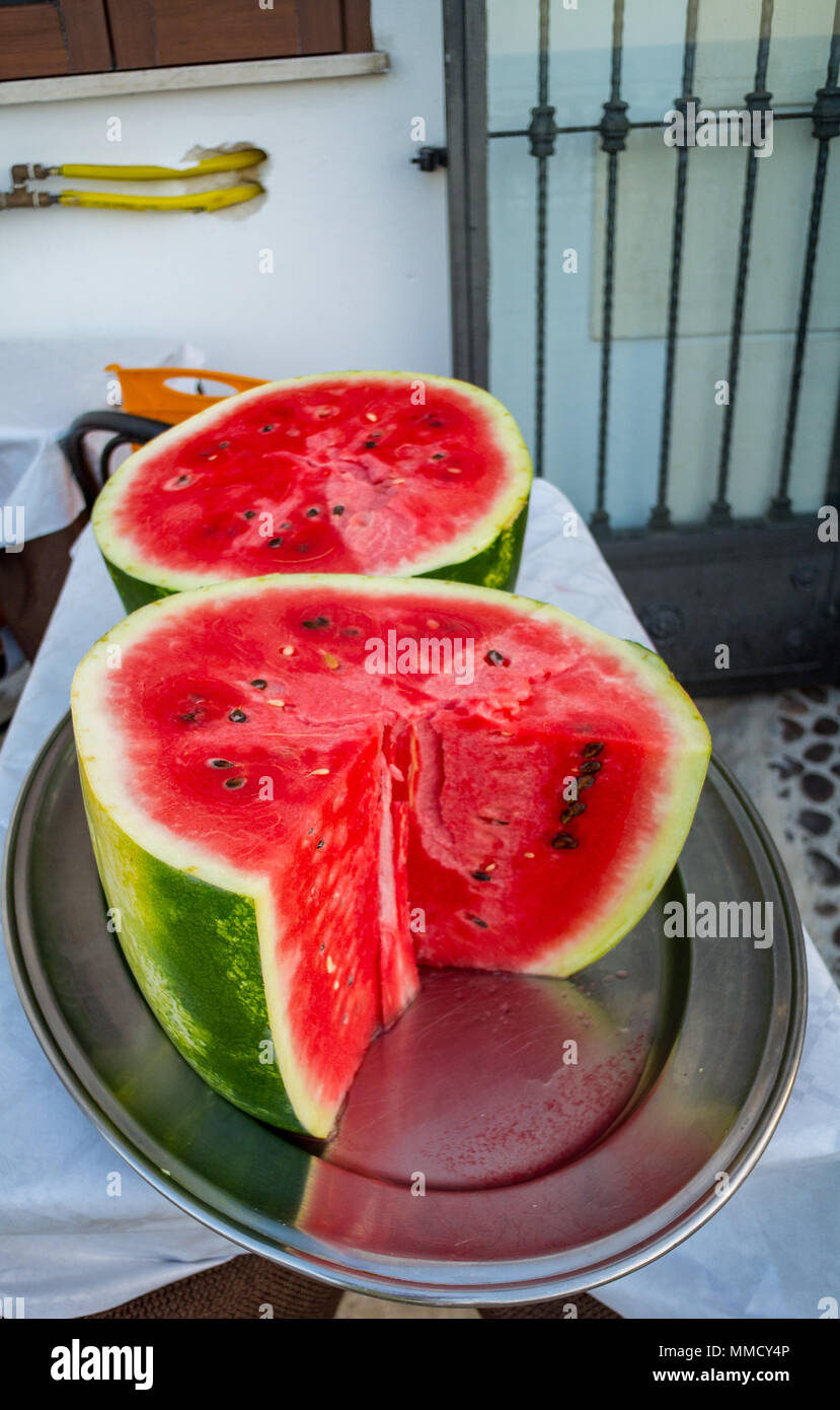 cut watermelon on a table, sicily, italy Stock Photo