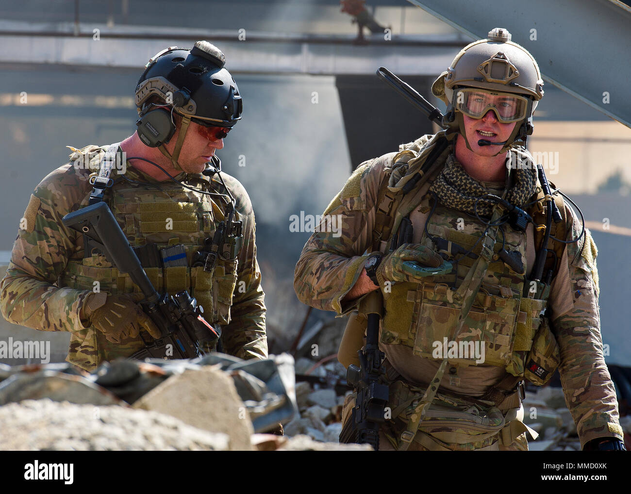 U.S. Air Force Staff Sgt. Sam Bohling, left, pararescueman, and Capt ...