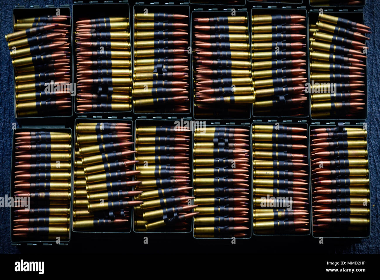 171012-N-GP724-1178 PACIFIC OCEAN (Oct. 12, 2017) Fifty-caliber ammunition sit in ammo cans awaiting to be fired during a crew-served weapons qualification aboard the aircraft carrier USS Theodore Roosevelt (CVN 71). Theodore Roosevelt departed San Diego for a scheduled deployment, Oct. 6, to the U.S. 7th and 5th Fleet areas of responsibility in support of maritime security operations and theater security cooperation efforts. (U.S. Navy photo by Mass Communication Specialist 3rd Class Alex Perlman/Released) Stock Photo