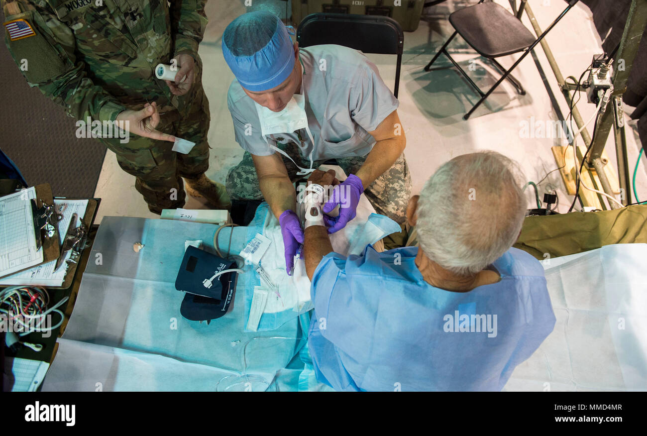 A local resident from Humacao, Puerto Rico is prepared for hand surgery ...