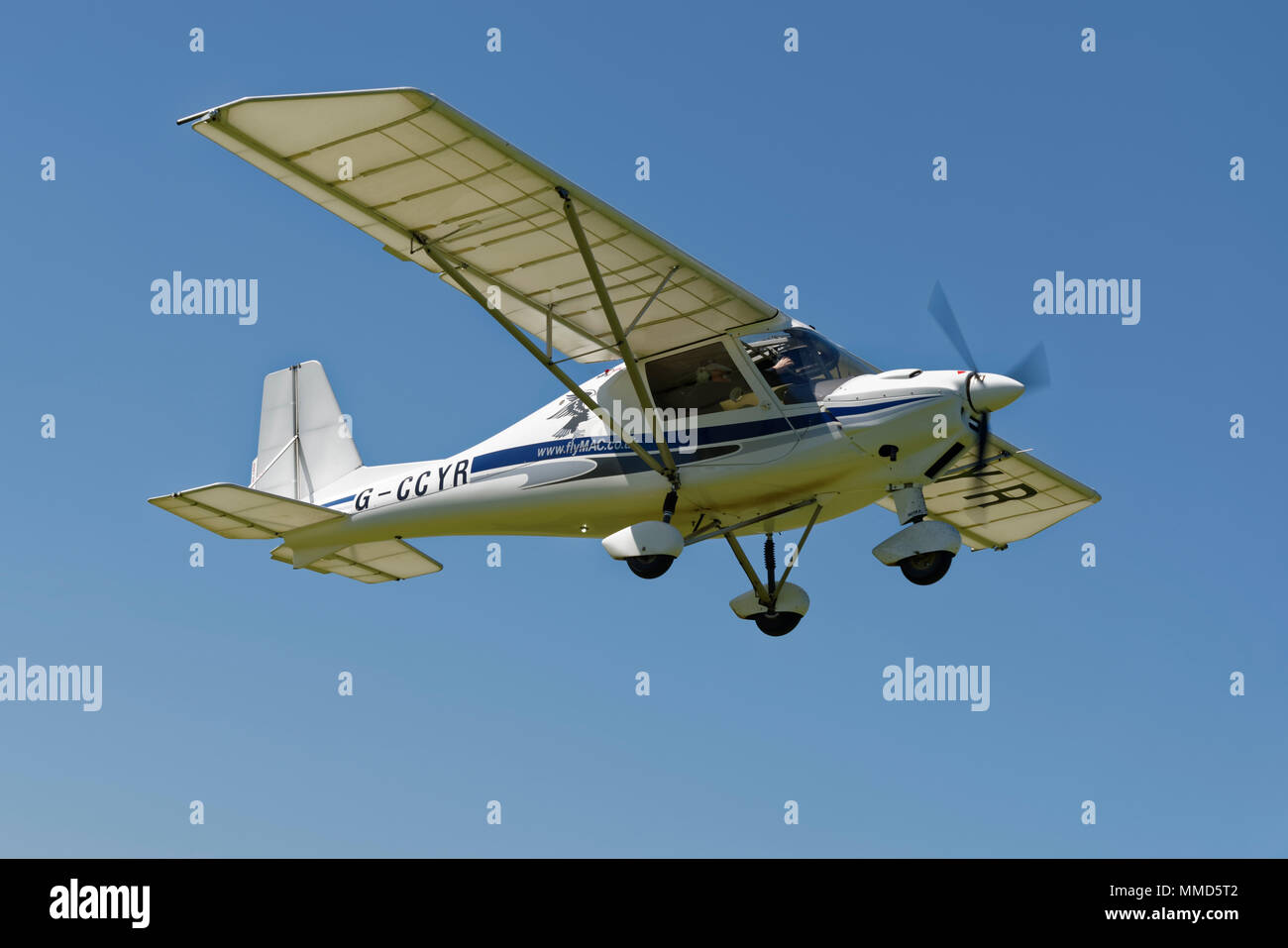 Ikarus C42 microlight aircraft registration G-CCYR takes off from Popham Airfield in Hampshire, UK Stock Photo