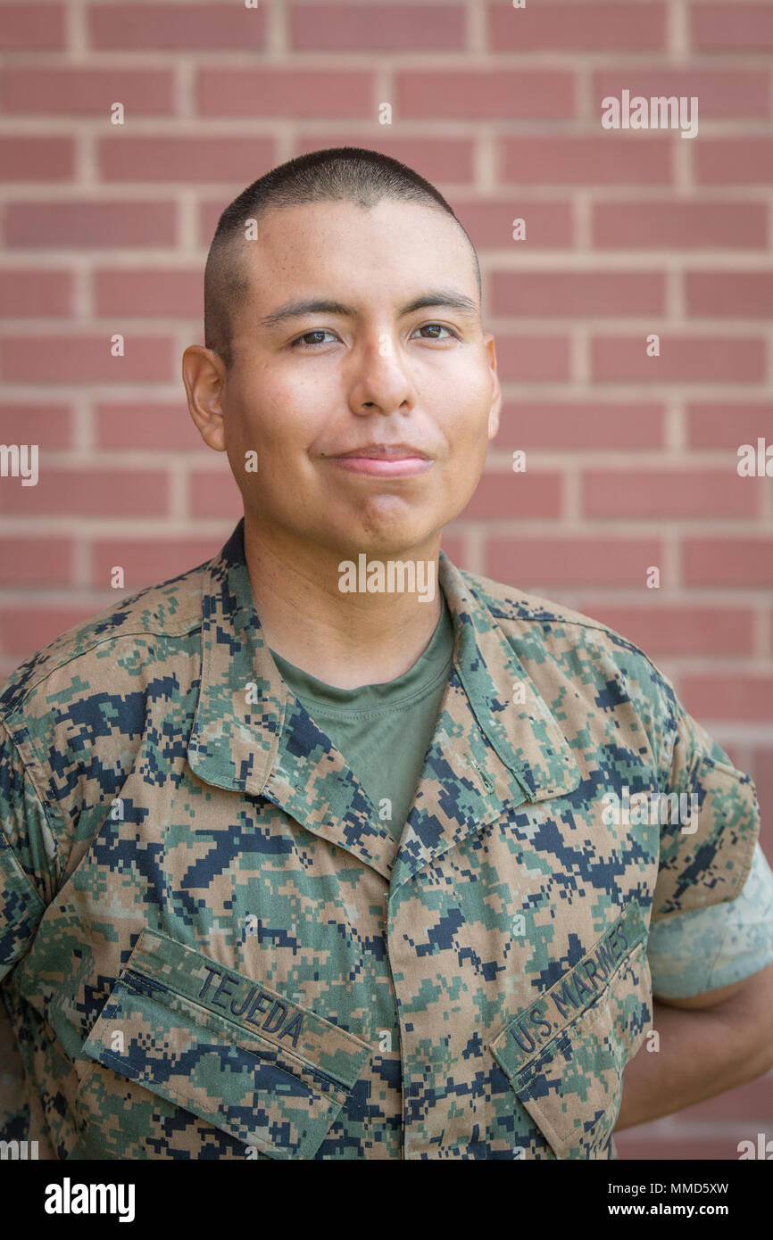 Pvt. Percy Tejeda, Platoon 3078, Lima Company, 3rd Recruit Training Battalion, earned U.S. citizenship Oct. 12, 2017, on Parris Island, S.C. Before earning citizenship, applicants must demonstrate knowledge of the English language and American government, show good moral character and take the Oath of Allegiance to the U.S. Constitution. Tejeda, from Queens, N.Y., originally from Peru, is scheduled to graduate Oct. 13, 2017. (Photo by Cpl. Joseph Jacob) Stock Photo