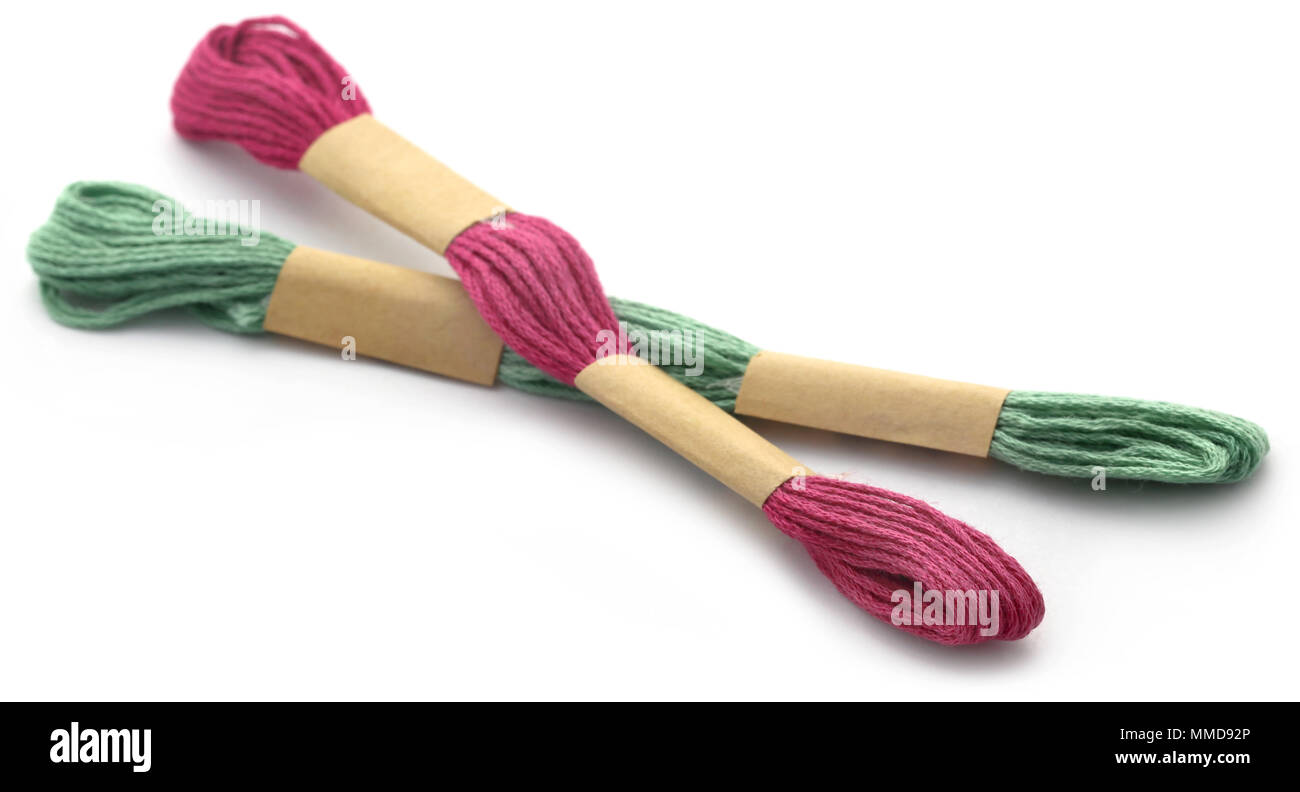 Woolen thread over white background Stock Photo - Alamy