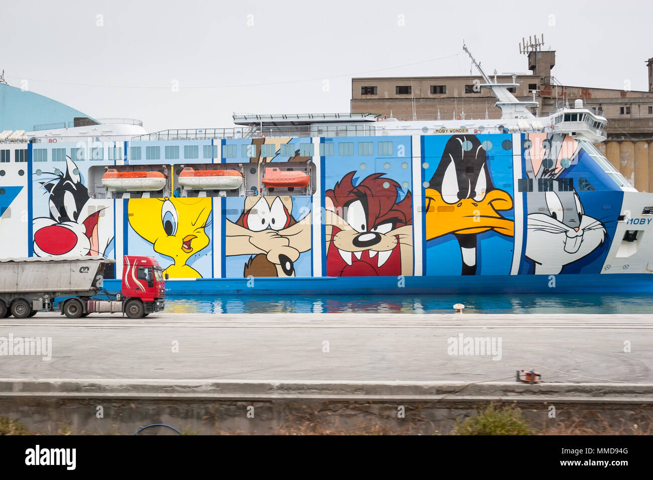 LA SPEZIA, ITALY : JUNE 15th, 2005 : Moby Lines Moby Wonder ferry ship with characters of Looney Tunes drawn at the side of the ship, docked in a port Stock Photo