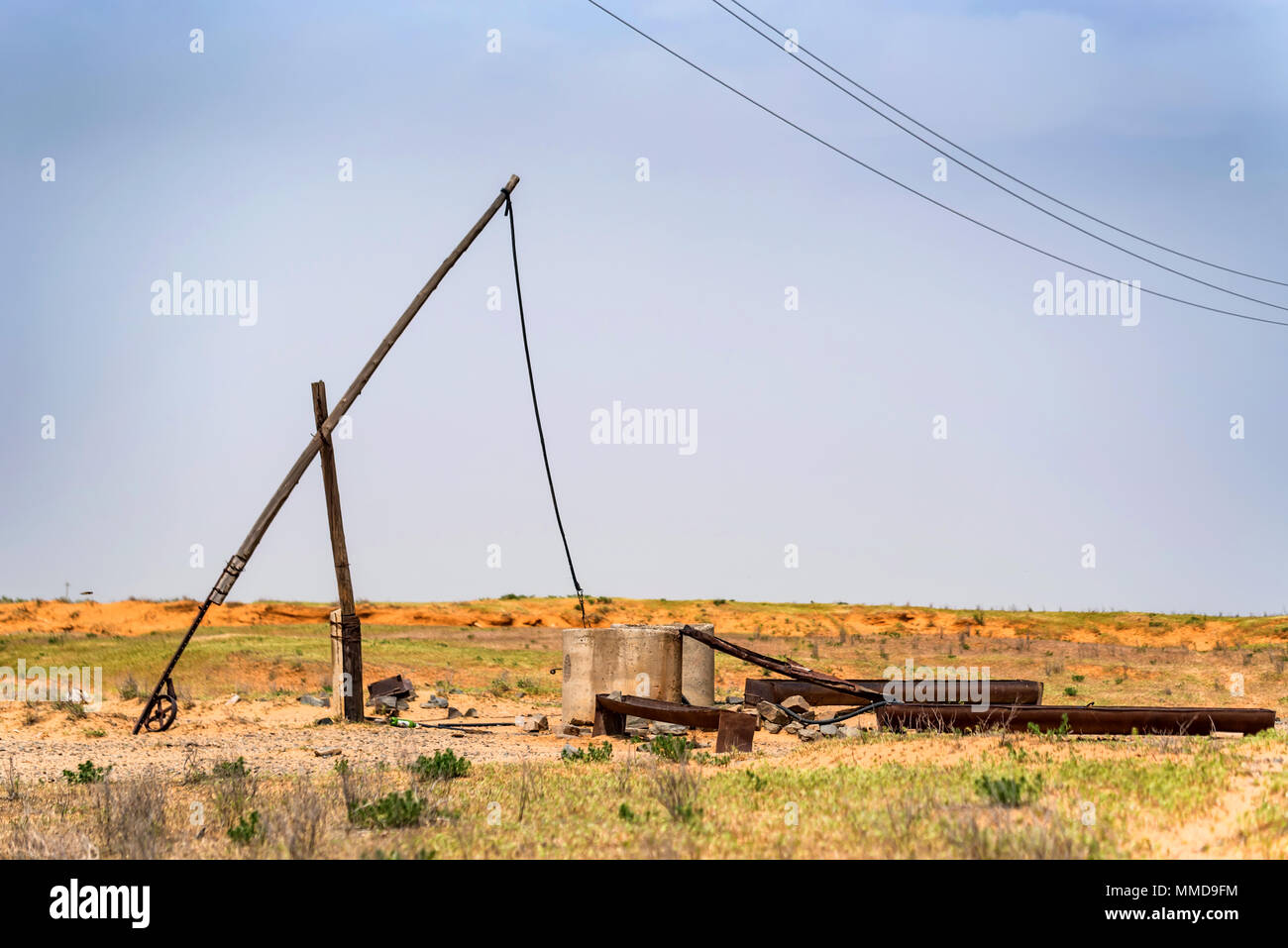 Old sweep well and shadoof in steppe Stock Photo