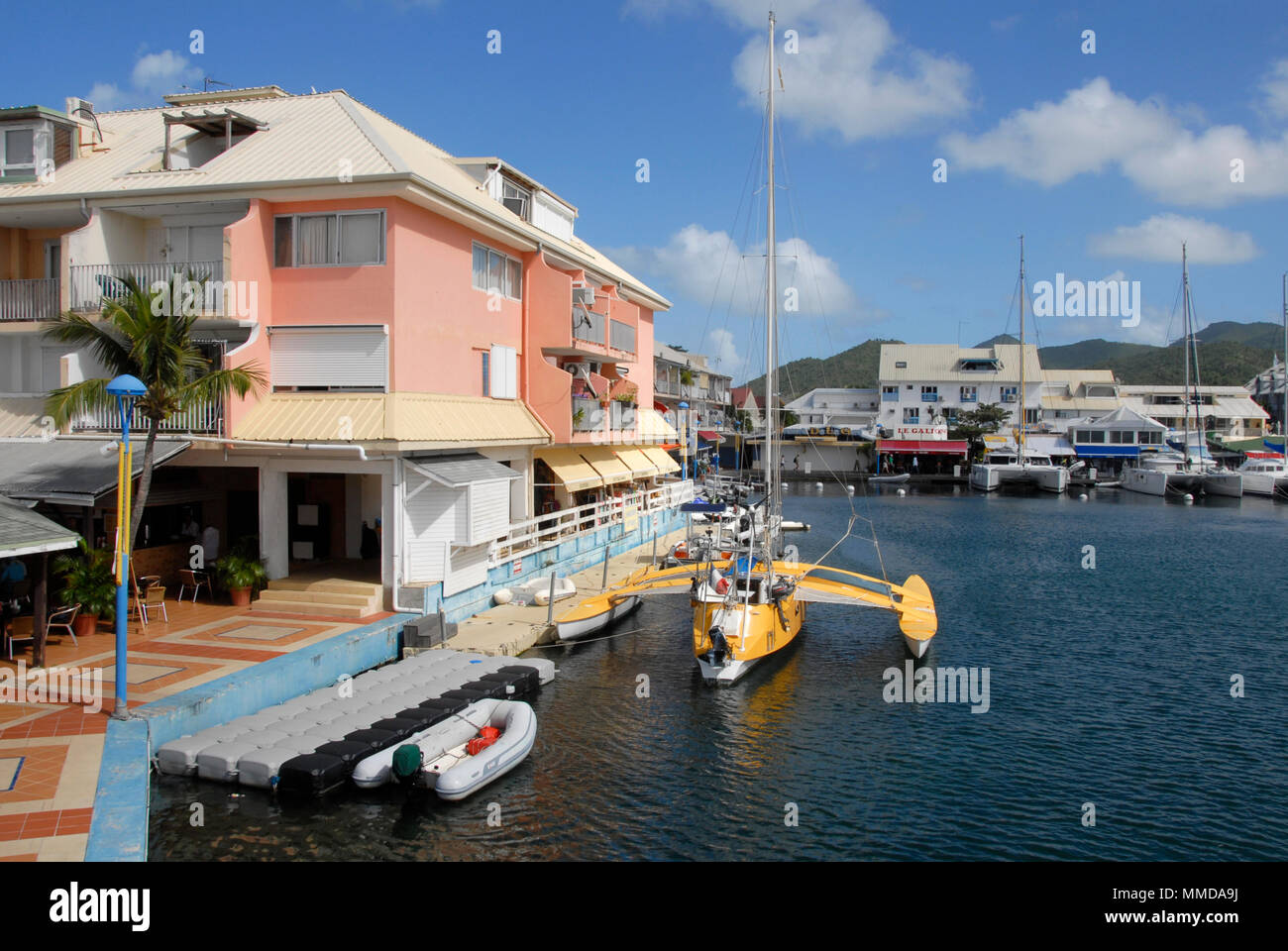 Trimaran berthed at Port La Royale marina, St Martin, Caribbean Stock Photo