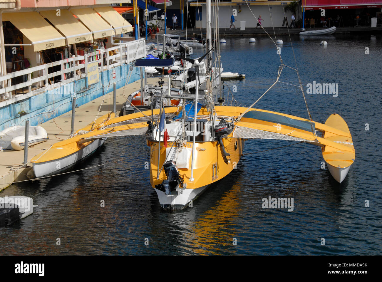 Trimaran berthed at Port La Royale marina, St Martin, Caribbean Stock Photo