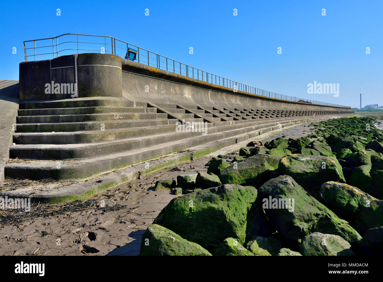 Low tide showing concrete sea defence against high tide along Severn Estuary at Severn Beach, UK Stock Photo
