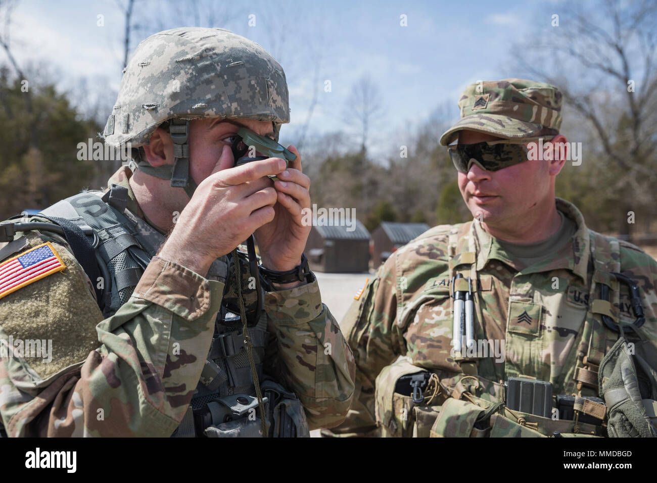 U.S. Army Reserve Sgt. Matthew Lafleur, with the 450th Civil Affairs Battalion, 364th Civil Affairs Brigade, Virginia Beach, Virginia, grades a Soldier during land navigation training, as part of the Combat Support Training Exercise (CSTX 78-18-03) at Fort Knox, Kentucky, March 18, 2018. CSTX 78-18-03 is a Combat Support Training Exercise that ensures America's Army Reserve units and Soldiers are trained and ready to deploy on short-notice and bring capable, combat-ready, and lethal firepower in support of the Army and our joint partners anywhere in the world. (U.S. Army Stock Photo