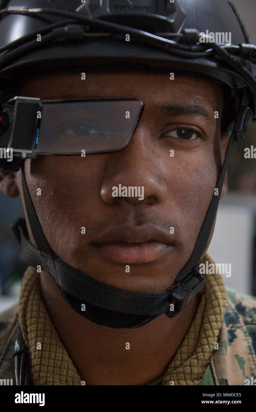 U.S. Marine Corps Lance Cpl. Rockwell Collins, an infantryman with 3rd Battalion, 4th Marine Regiment, 1st Marine Division, wears a Head-Up Display (HUD) during Urban Advanced Naval Technology Exercise 2018 (ANTX18) at Marine Corps Base Camp Pendleton, California, March 20, 2018. The Marines are testing next generation technologies to provide the opportunity to assess the operational utility of emerging technologies and engineering innovations that improve the Marine’s survivability, lethality and connectivity in complex urban environments. (U.S. Marine Corps Stock Photo