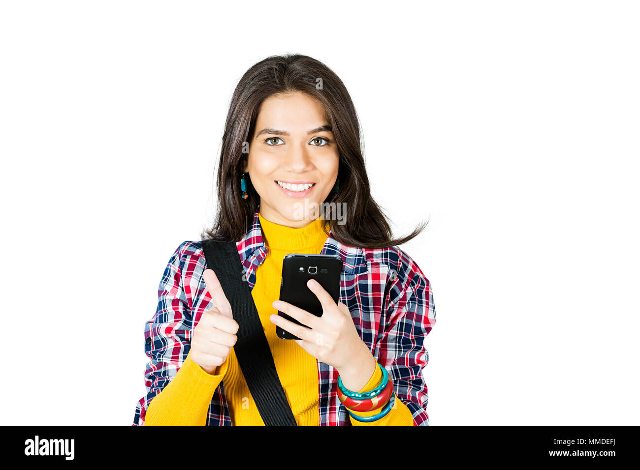 One Young Woman college student SendingText-Message On Mobile Phone Stock Photo