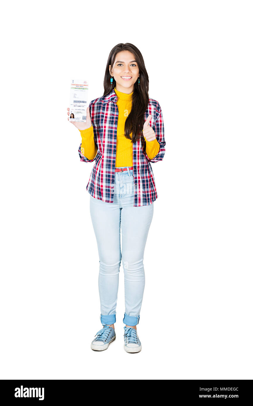 One Young Woman Showing Thumbs-up With Aadhaar Card Government -Identity Proof Stock Photo