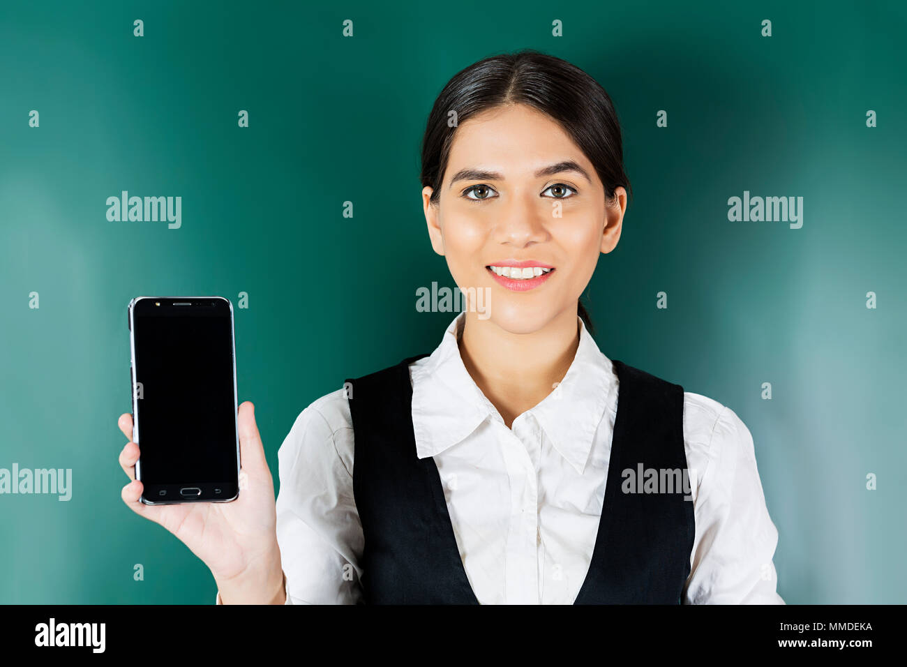 One Young Lady Business Woman Employee Standing On Colored Background Stock Photo