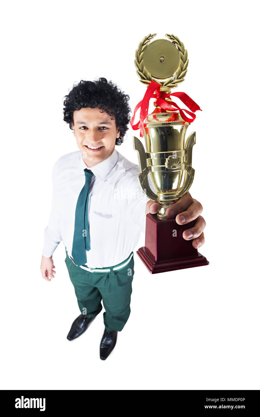 One Teenage School Boy Student Showing Winning Trophy Success Celebration Stock Photo