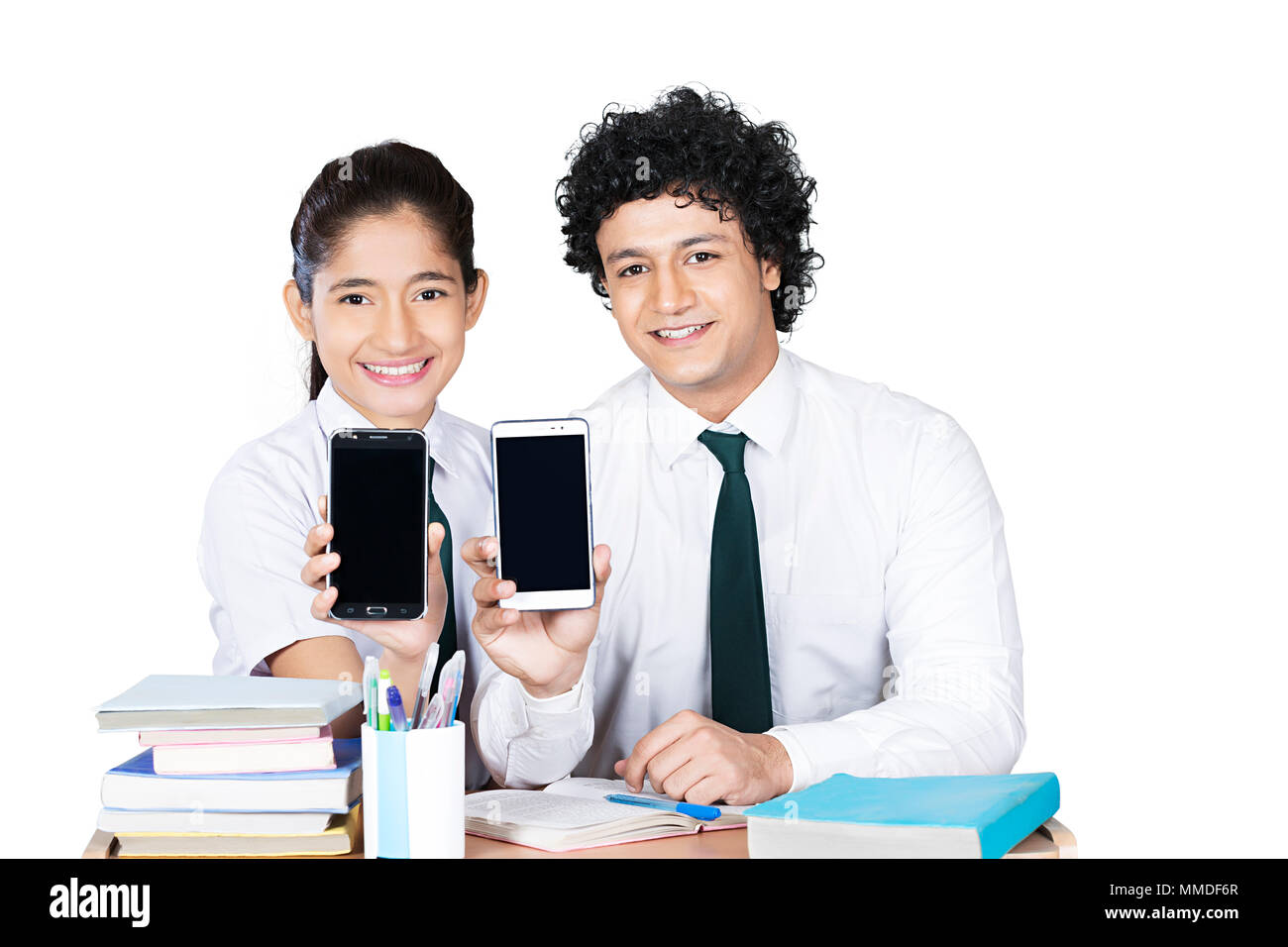 Two Teenager High School Students Friend Classmate Showing Smartphone In-Class Stock Photo