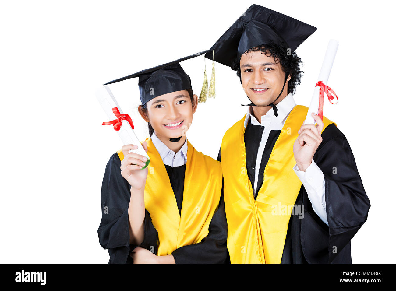 Two Teenager College Girl, Boy in graduation gown holding Degree -Certificate Stock Photo