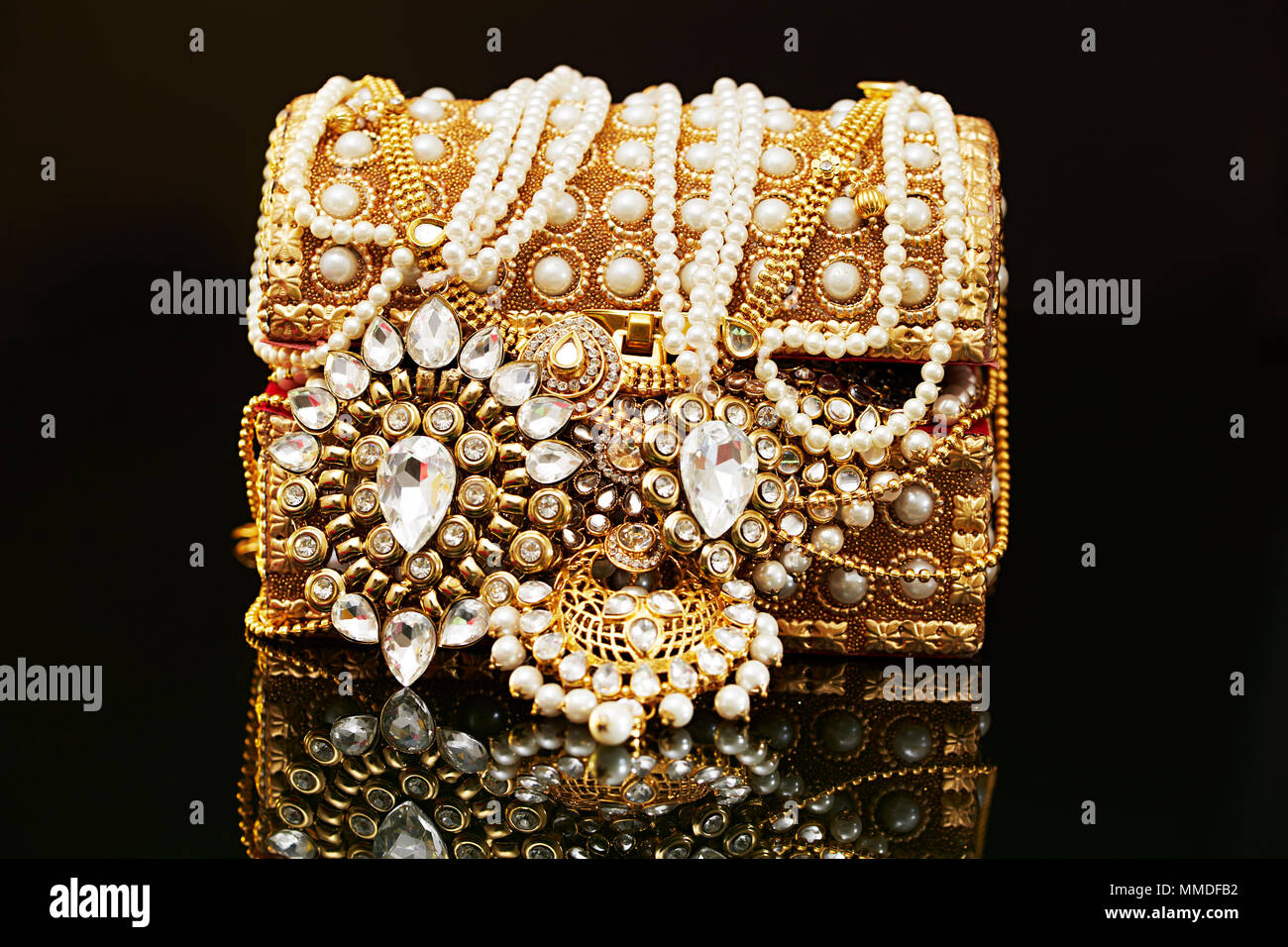 Gold necklace black background hires stock photography and images Alamy