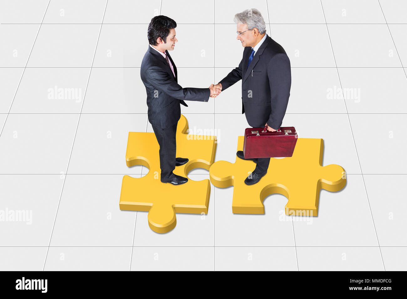 Two Bussiness-People partnership meeting. Successful businessmen handshaking after good deal Jigsaw Puzzle Stock Photo